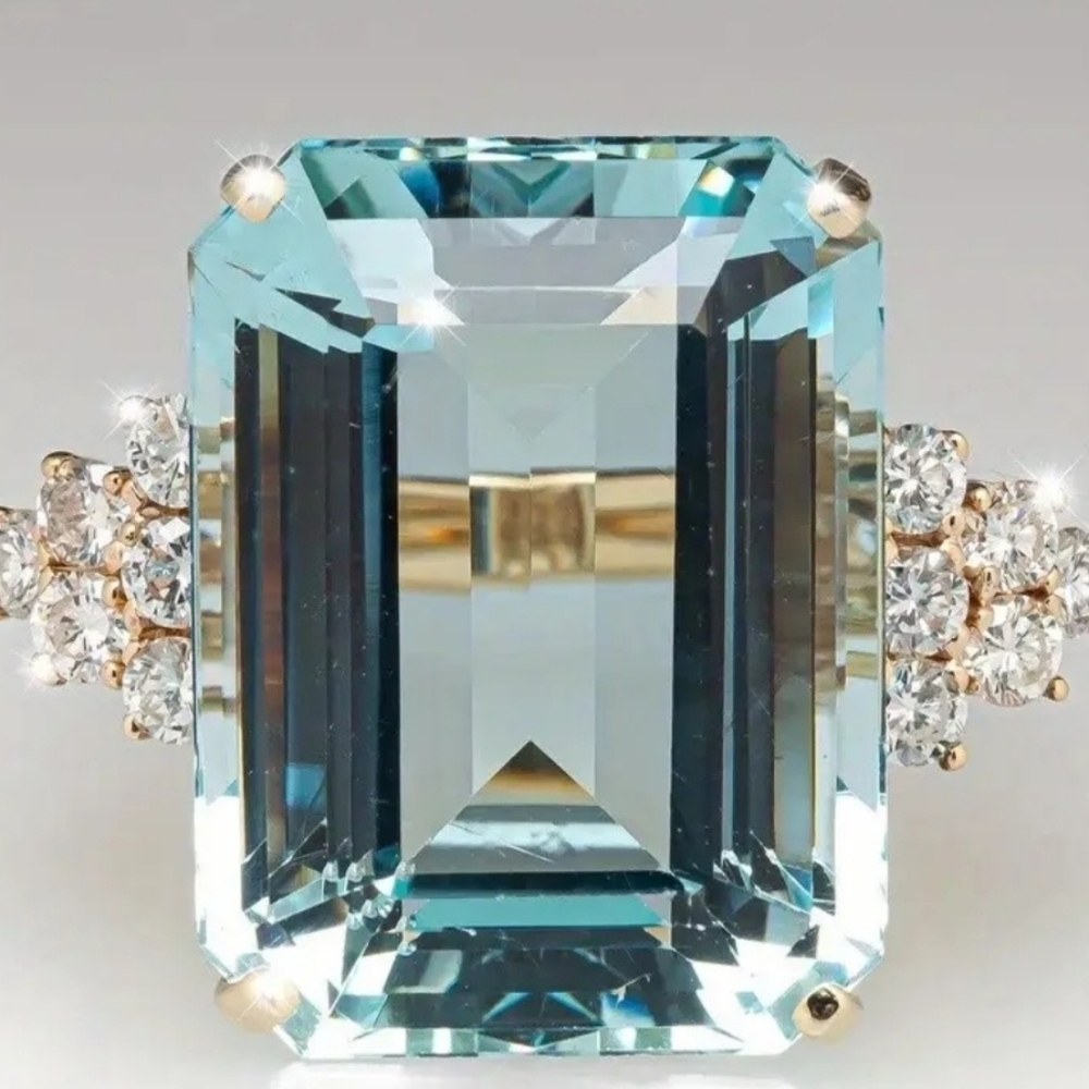 Elegant Gold and Blue Gemstone Ring